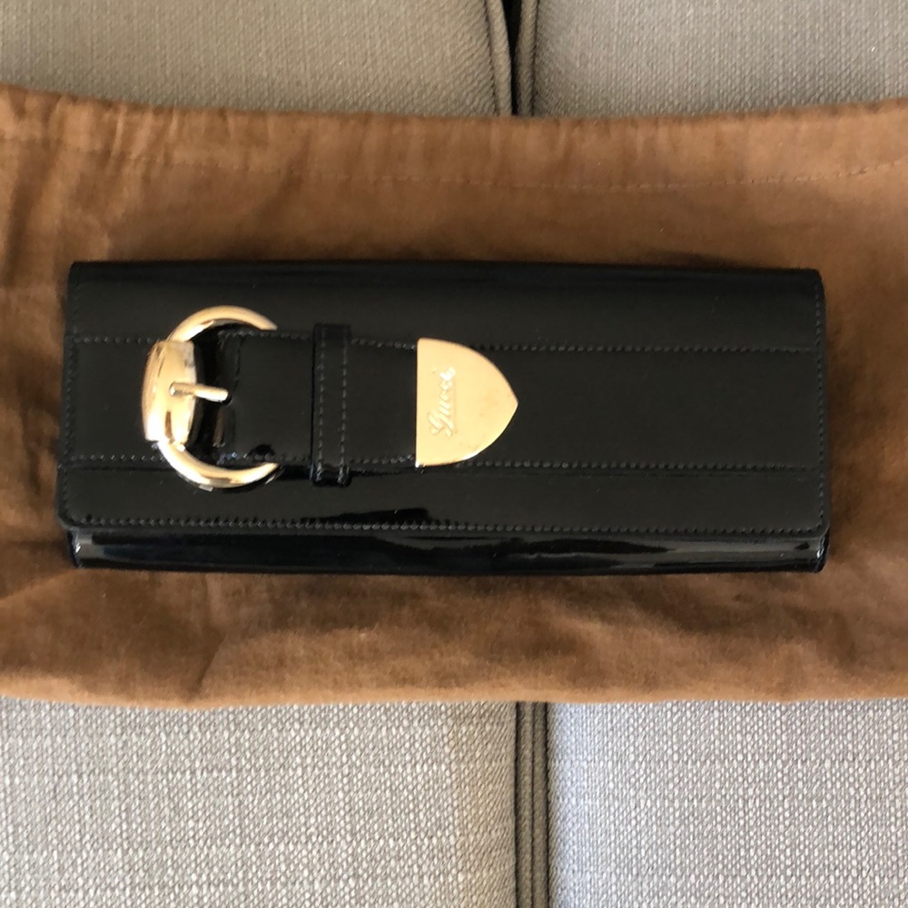 Gently used Gucci clutch black patent